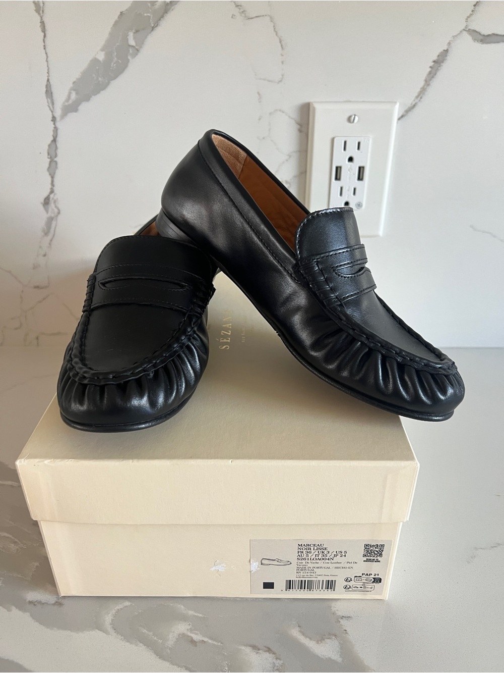 Sezane Black Leather Penny Loafers with Moc Toe Detailing